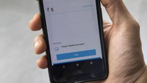 The digital payment service Paytm, developed by One97 Communications Ltd., is demonstrated during an arranged photograph in Bengaluru, India, on August 19.(Bloomberg) The digital payment service Paytm, developed by One97 Communications Ltd., is demonstrated during an arranged photograph in Bengaluru, India, on August 19.(Bloomberg)