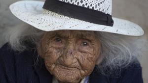 Julia Flores Colque eyes the camera while sitting outside her home in Sacaba, Bolivia in this August 23, 2018 photo .(AP)