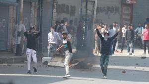 Kashmiri protesters throw stones at police and paramilitary forces during a protest at Lal Chowk area in Srinagar following rumours about scrapping of Article 35A.(Waseem Andrabi/ HT Photo) Kashmiri protesters throw stones at police and paramilitary forces during a protest at Lal Chowk area in Srinagar following rumours about scrapping of Article 35A.(Waseem Andrabi/ HT Photo)