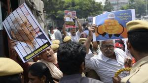 Activists of the Communist Party of India (Marxist-Leninist) New Democracy shout slogans during a protest against the arrest of poet and activist Varavara Rao in Hyderabad on August 29.(AFP Photo) Activists of the Communist Party of India (Marxist-Leninist) New Democracy shout slogans during a protest against the arrest of poet and activist Varavara Rao in Hyderabad on August 29.(AFP Photo)