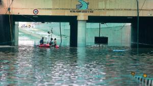 Officials are in the process of draining rainwater from the underpass, but said more rain could hamper the work.(Sanjeev Verma/HT PHOTO)
