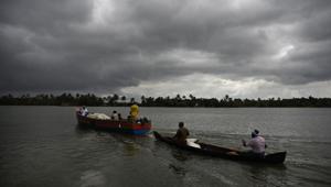Flood-affected people who had taken refuge in relief camps return to their houses in boats in Kuttanad, Alappuzha, in Kerala.(AP File Photo) Flood-affected people who had taken refuge in relief camps return to their houses in boats in Kuttanad, Alappuzha, in Kerala.(AP File Photo)