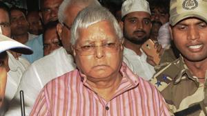 RJD leader Lalu Prasad arrives at the airport to surrender at the CBI court in connection with multi-crore fodder scam case, in Ranchi.(PTI File Photo) RJD leader Lalu Prasad arrives at the airport to surrender at the CBI court in connection with multi-crore fodder scam case, in Ranchi.(PTI File Photo)