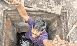 Satish Chavan spends over 12 hours a day climbing in and out of manholes for minimum wage. He dreams that someday he will run his own grocery store.(HT Photo) Satish Chavan spends over 12 hours a day climbing in and out of manholes for minimum wage. He dreams that someday he will run his own grocery store.(HT Photo)