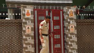 A policeman comes out of the house in Brijpura, Pataudi, where four members of a family were murdered on Wednesday.(Parveen Kumar / HT Photo) A policeman comes out of the house in Brijpura, Pataudi, where four members of a family were murdered on Wednesday.(Parveen Kumar / HT Photo)