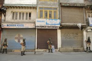 A paramilitary soldier stands guard near a closed market during restrictions in downtown area of Srinagar. Authorities imposed restrictions in some parts of downtown Srinagar as separatist leaders have called for a shutdown on 30 and 31 August 2018 as a mark of protest to protect Article 35-A.(Waseem Andrabi/ Hindustan Times) A paramilitary soldier stands guard near a closed market during restrictions in downtown area of Srinagar. Authorities imposed restrictions in some parts of downtown Srinagar as separatist leaders have called for a shutdown on 30 and 31 August 2018 as a mark of protest to protect Article 35-A.(Waseem Andrabi/ Hindustan Times)