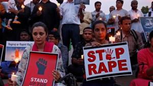 People hold a candle light vigil in protest against the incidence of rapes after the cases of an eight-year-old girl in Jammu, and a teenager in Uttar Pradesh came to light, in Bengaluru on April 13, 2018.(Reuters File Photo) People hold a candle light vigil in protest against the incidence of rapes after the cases of an eight-year-old girl in Jammu, and a teenager in Uttar Pradesh came to light, in Bengaluru on April 13, 2018.(Reuters File Photo)