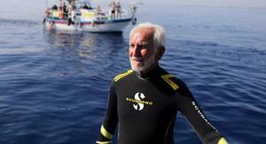 Ray Woolley, pioneer diver and World War II veteran, is seen before breaking a new diving record as he turns 95 by taking the plunge at the Zenobia, a cargo ship wreck off the Cypriot town of Larnaca, Cyprus on September 1.(REUTERS) Ray Woolley, pioneer diver and World War II veteran, is seen before breaking a new diving record as he turns 95 by taking the plunge at the Zenobia, a cargo ship wreck off the Cypriot town of Larnaca, Cyprus on September 1.(REUTERS)