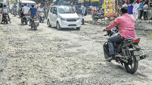 The potholes are primarily in front of the central water and power research station (CWPRS).(Sanket Wankhade/HT PHOTO) The potholes are primarily in front of the central water and power research station (CWPRS).(Sanket Wankhade/HT PHOTO)