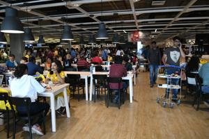 Customers eats at a restaurant at the new IKEA store in Hyderabad.(AFP Photo) Customers eats at a restaurant at the new IKEA store in Hyderabad.(AFP Photo)