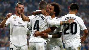 Soccer Football - La Liga Santander - Real Madrid v Leganes - Santiago Bernabeu, Madrid, Spain - September 1, 2018 Real Madrid's Sergio Ramos celebrates scoring their fourth goal with team mates(REUTERS) Soccer Football - La Liga Santander - Real Madrid v Leganes - Santiago Bernabeu, Madrid, Spain - September 1, 2018 Real Madrid's Sergio Ramos celebrates scoring their fourth goal with team mates(REUTERS)