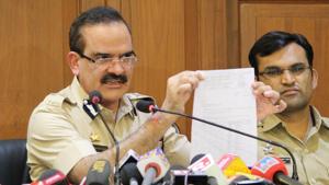 Maharashtra ADG Param Bir Singh with Pune's Additional CP Shivaji Bodke (L)Dr.Shivaji Pawar(R) adressed a press conference about the house arrest of rights activists in Bhima Koregaon case, at DGP office, in Mumbai on Friday.(PTI) Maharashtra ADG Param Bir Singh with Pune's Additional CP Shivaji Bodke (L)Dr.Shivaji Pawar(R) adressed a press conference about the house arrest of rights activists in Bhima Koregaon case, at DGP office, in Mumbai on Friday.(PTI)