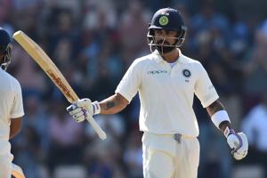 India's captain Virat Kohli celebrates reaching his fifty during play on the fourth day of the fourth Test cricket match between England and India in Southampton(AFP) India's captain Virat Kohli celebrates reaching his fifty during play on the fourth day of the fourth Test cricket match between England and India in Southampton(AFP)