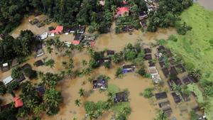 An aerial view shows partially submerged houses at a flooded area in Kerala.(Reuters/File Photo) An aerial view shows partially submerged houses at a flooded area in Kerala.(Reuters/File Photo)