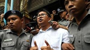 Reuters journalist Wa Lone departs Insein court after his verdict announcement in Yangon, Myanmar, September 3, 2018.(REUTERS)