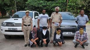 Robbers arrested with two vehicles and a toy gun in CIA staff custody in Jalandhar on Tuesday.(Pardeep Pandit/HT) Robbers arrested with two vehicles and a toy gun in CIA staff custody in Jalandhar on Tuesday.(Pardeep Pandit/HT)
