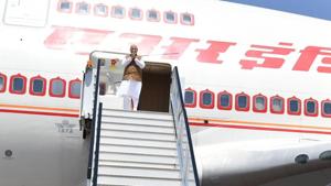 Prime Minister Narendra Modi stands at the top of the stairs to his airplane in Kigali, Rwanda on July 24.(AFP Photo) Prime Minister Narendra Modi stands at the top of the stairs to his airplane in Kigali, Rwanda on July 24.(AFP Photo)