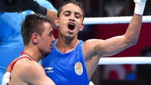 Amit Panghal (in blue) gestures after defeating Uzbekistan's Hasanboy Dusmatov to clinch the gold medal in boxing.(PTI) Amit Panghal (in blue) gestures after defeating Uzbekistan's Hasanboy Dusmatov to clinch the gold medal in boxing.(PTI)