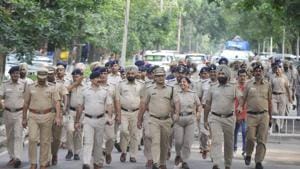 Police holding a flag march on the eve of student elections at Panjab University.(HT Photo) Police holding a flag march on the eve of student elections at Panjab University.(HT Photo)