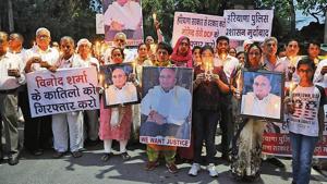 Relatives and friends of property dealer Vinod Sharma took out a candle light march demanding that the probe be transferred to the CBI. The case was later handed over to the crime branch. (Parveen Kumar/HT File) Relatives and friends of property dealer Vinod Sharma took out a candle light march demanding that the probe be transferred to the CBI. The case was later handed over to the crime branch. (Parveen Kumar/HT File)