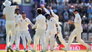 England's Moeen Ali (C) celebrates with teammates after taking the wicket of India's Ajinkya Rahane.(AFP) England's Moeen Ali (C) celebrates with teammates after taking the wicket of India's Ajinkya Rahane.(AFP)