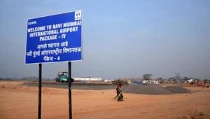 A notice indicating the site of the Navi Mumbai International Airport in Ulwe. (Bachchan Kumar/ HT Photo)
