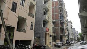 According to officials, three to four storey buildings have been constructed on these plots, in violation of building norms. Power department ordered to sever connections. (Parveen Kumar/HT File) According to officials, three to four storey buildings have been constructed on these plots, in violation of building norms. Power department ordered to sever connections. (Parveen Kumar/HT File)