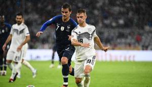 Germany's midfielder Joshua Kimmich (R) vies with France's forward Antoine Griezmann during the UEFA Nations League football match Germany against France on September 6, 2018 at the Allianz Arena in Munich, southern Germany. (Photo by FRANCK FIFE / AFP)(AFP) Germany's midfielder Joshua Kimmich (R) vies with France's forward Antoine Griezmann during the UEFA Nations League football match Germany against France on September 6, 2018 at the Allianz Arena in Munich, southern Germany. (Photo by FRANCK FIFE / AFP)(AFP)