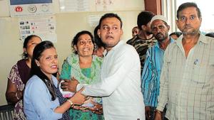 The family of the baby who died for want of an ambulance for transport to a private hospital.(HT Photo) The family of the baby who died for want of an ambulance for transport to a private hospital.(HT Photo)