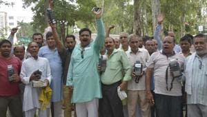 Ration dealers demand scrapping of FIRs lodged against them in connection with the ‘ration scam’ at Ghaziabad last month. (Sakib Ali /HT Photo) Ration dealers demand scrapping of FIRs lodged against them in connection with the ‘ration scam’ at Ghaziabad last month. (Sakib Ali /HT Photo)