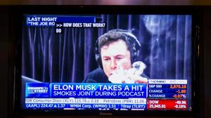 Elon Musk, chief executive officer of Telsa Inc, is seen on a television on the floor of the New York Stock Exchange (NYSE) in New York, US.(Bloomberg) Elon Musk, chief executive officer of Telsa Inc, is seen on a television on the floor of the New York Stock Exchange (NYSE) in New York, US.(Bloomberg)