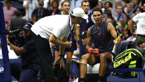 NEW YORK, NY - SEPTEMBER 07: Rafael Nadal of Spain is looked at by the trainer during his men's singles semi-final match against Juan Martin del Potro of Argentina on Day Twelve of the 2018 US Open at the USTA Billie Jean King National Tennis Center on September 7, 2018(AFP) NEW YORK, NY - SEPTEMBER 07: Rafael Nadal of Spain is looked at by the trainer during his men's singles semi-final match against Juan Martin del Potro of Argentina on Day Twelve of the 2018 US Open at the USTA Billie Jean King National Tennis Center on September 7, 2018(AFP)