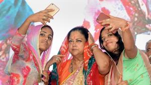 Two women take selfies with Rajasthan chief minister Vasundhara Raje during the 'Rajasthan Gaurav Yatra' at Baytu .(PTI) Two women take selfies with Rajasthan chief minister Vasundhara Raje during the 'Rajasthan Gaurav Yatra' at Baytu .(PTI)