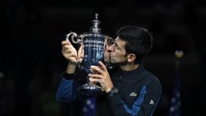 Novak Djokovic poses with the championship trophy after winning his men's Singles finals match against Juan Martin del Potro of Argentina at the US Open.(AFP) Novak Djokovic poses with the championship trophy after winning his men's Singles finals match against Juan Martin del Potro of Argentina at the US Open.(AFP)