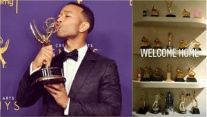 John Legend kisses his Emmy award after a big win.(Instagram)