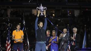 Novak Djokovic, of Serbia, holds up the championship trophy after defeating Juan Martin del Potro, of Argentina, during the men's final of the U.S. Open tennis tournament, Sunday, Sept. 9, 2018, in New York.(AP) Novak Djokovic, of Serbia, holds up the championship trophy after defeating Juan Martin del Potro, of Argentina, during the men's final of the U.S. Open tennis tournament, Sunday, Sept. 9, 2018, in New York.(AP)