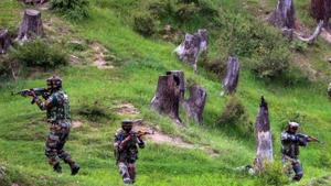 Army personnel in Kupwara district of Kashmir. Security forces unearthed a cave hideout used by terrorists in Jammu and Kashmir’s Rajouri district and seized a huge cache of arms and ammunition from it on Tuesday, police said.(Representative Image/PTI Photo) Army personnel in Kupwara district of Kashmir. Security forces unearthed a cave hideout used by terrorists in Jammu and Kashmir’s Rajouri district and seized a huge cache of arms and ammunition from it on Tuesday, police said.(Representative Image/PTI Photo)