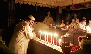 Praying at a dargah in Guwahati on Shab-e-baarat.(AP) Praying at a dargah in Guwahati on Shab-e-baarat.(AP)