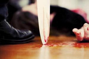 "Close up on a bloody knife planted on a wooden floor, a killing scene"(Getty Images) "Close up on a bloody knife planted on a wooden floor, a killing scene"(Getty Images)