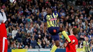 Central Coast Mariners' Usain Bolt in action.(REUTERS) Central Coast Mariners' Usain Bolt in action.(REUTERS)