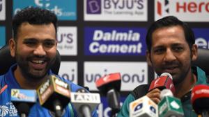 Pakistan cricket captain Sarfraz Ahmed (R) speaks during an Asia Cup press conference as Indian cricket team captain Rohit Sharma looks on at the Dubai International Cricket Stadium.(AFP) Pakistan cricket captain Sarfraz Ahmed (R) speaks during an Asia Cup press conference as Indian cricket team captain Rohit Sharma looks on at the Dubai International Cricket Stadium.(AFP)