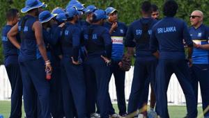 Sri Lankan coach Chandika Hathurusingha (3R) talks with team members during a training session in Dubai.(AFP) Sri Lankan coach Chandika Hathurusingha (3R) talks with team members during a training session in Dubai.(AFP)