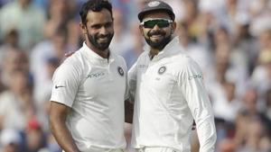 India's Hanuma Vihari, left, celebrates taking the wicket of England's Sam Curran with captain Virat Kohli.(AP) India's Hanuma Vihari, left, celebrates taking the wicket of England's Sam Curran with captain Virat Kohli.(AP)