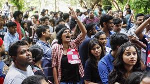 As polling began at 9:30 am, supporters of all political groups were spotted shouting slogans and dancing to beats of tambourine outside the polling booths.(PTI) As polling began at 9:30 am, supporters of all political groups were spotted shouting slogans and dancing to beats of tambourine outside the polling booths.(PTI)