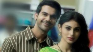 Rajkummar Rao plays Raghu, a small-time businessman, and Mouni Roy plays Rukmini, his wife. Rajkummar Rao plays Raghu, a small-time businessman, and Mouni Roy plays Rukmini, his wife.