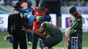 Bangladesh's Tamim Iqbal (2R) receives medical assistance after getting injured during Asia Cup 2018.(AFP) Bangladesh's Tamim Iqbal (2R) receives medical assistance after getting injured during Asia Cup 2018.(AFP)