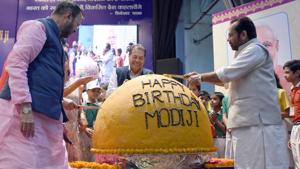 HRD minister Prakash Javadekar and minority affairs minister Mukhtar Abbas Naqvi at the unveiling of a 568 kg laddoo on PM Modi’s 68th birthday.(Sonu Mehta/HT Photo) HRD minister Prakash Javadekar and minority affairs minister Mukhtar Abbas Naqvi at the unveiling of a 568 kg laddoo on PM Modi’s 68th birthday.(Sonu Mehta/HT Photo)