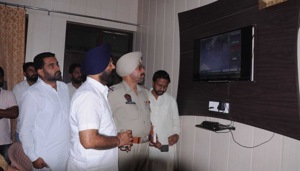 Police investigating the CCTV footage which recorded the incident.(HT PHOTO) Police investigating the CCTV footage which recorded the incident.(HT PHOTO)