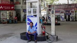 A security person guards at a petrol pump closed during the Bharat Bandh called against fuel price hike, in Coimbatore on September 10.(PTI Photo) A security person guards at a petrol pump closed during the Bharat Bandh called against fuel price hike, in Coimbatore on September 10.(PTI Photo)