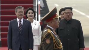 In this image made from video provided by Korea Broadcasting System (KBS), South Korean President Moon Jae-in, left, and his wife Kim Jung-sook, second from left, walk with North Korean leader Kim Jong Un and his wife Ri Sol Ju upon their arrival in Pyongyang, North Korea on September 18.(AP Photo) In this image made from video provided by Korea Broadcasting System (KBS), South Korean President Moon Jae-in, left, and his wife Kim Jung-sook, second from left, walk with North Korean leader Kim Jong Un and his wife Ri Sol Ju upon their arrival in Pyongyang, North Korea on September 18.(AP Photo)